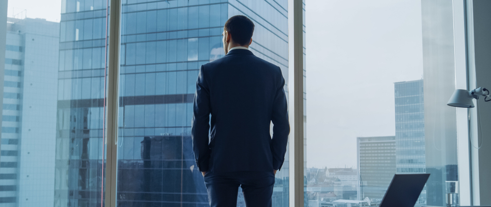 Professional man looking out