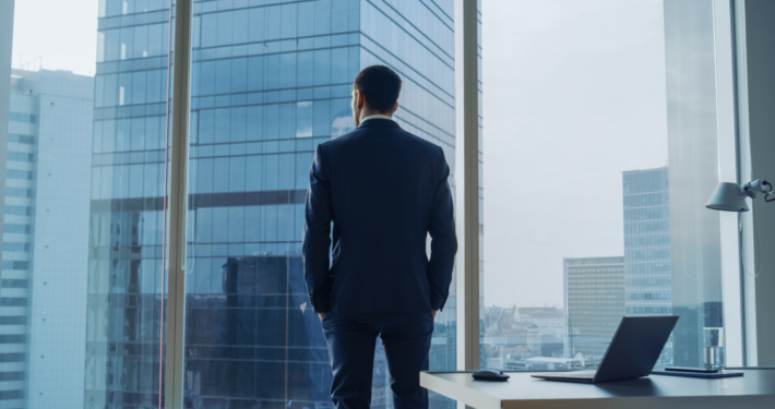 Professional man looking out